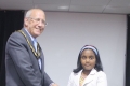 Under 10 British Girls Champion Tarini Jayaearna receiving her trophy from Brian Coffey